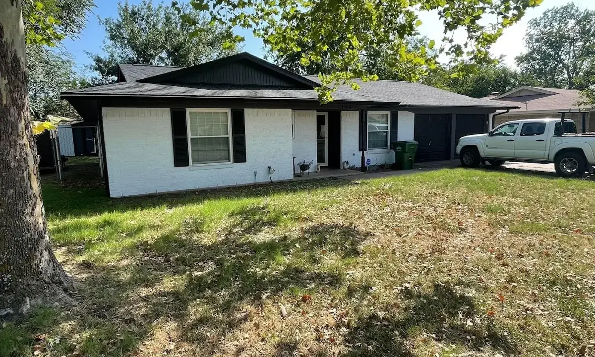 Professional roofing crew working on a residential roof in Anaheim